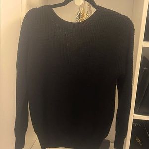 Super cute low-back crisscross cutout sweater with full front coverage